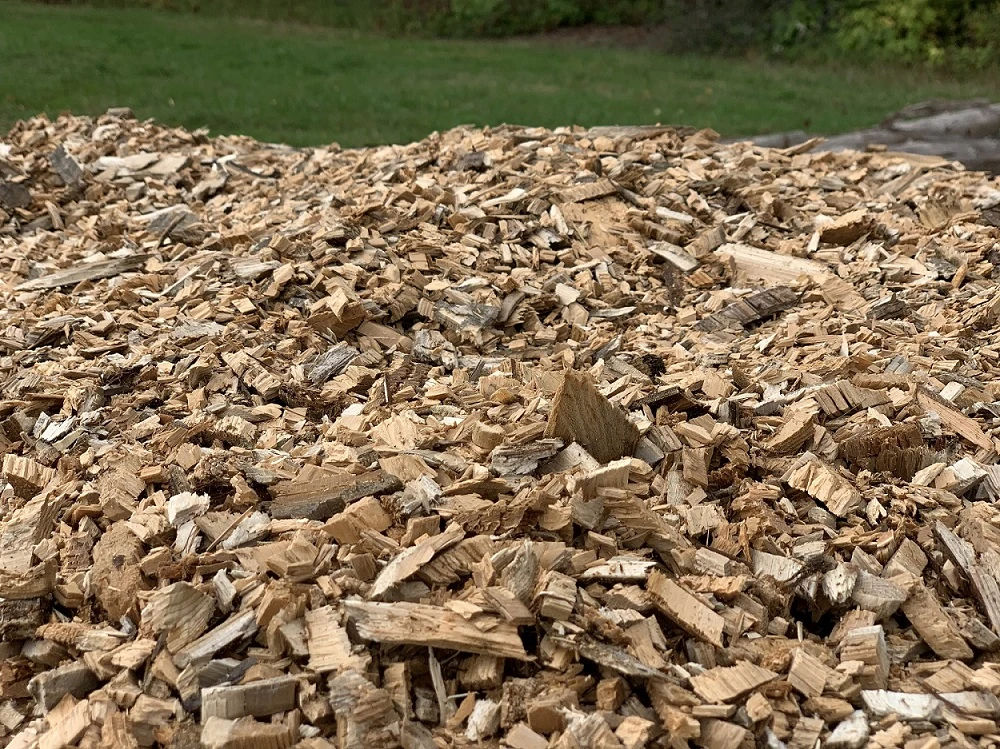 The Best Ways to Repurpose Your Wood Chips After Cleaning Up Your Treeline