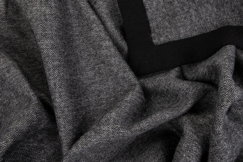 Embrace Warmth and Elegance with the Roca Throw from Tuwi's Pure Collection