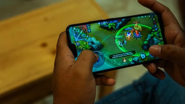 Why must businesses prefer mobile game apps instead of online gaming?