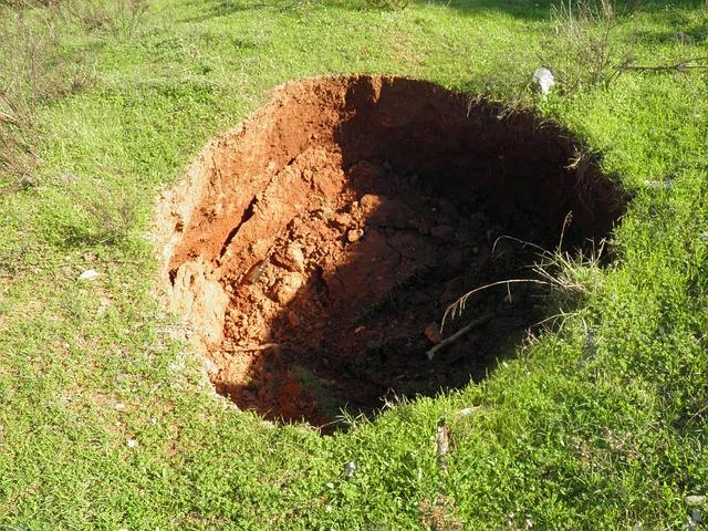 Sinkhole Warning Signs and When to Contact an Inspector