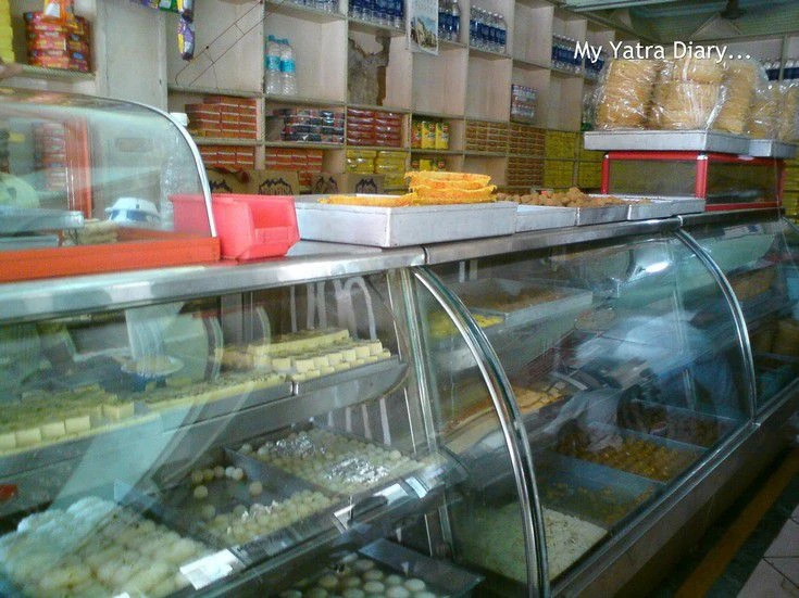 An array of sweets stacked up at Bharti Food, a sweetmeat Vrindavan restaurant