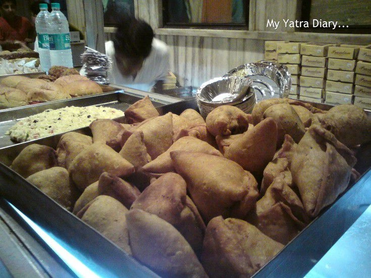 Samosas on sale at a food stall in ISKCON temple, Vrindavan