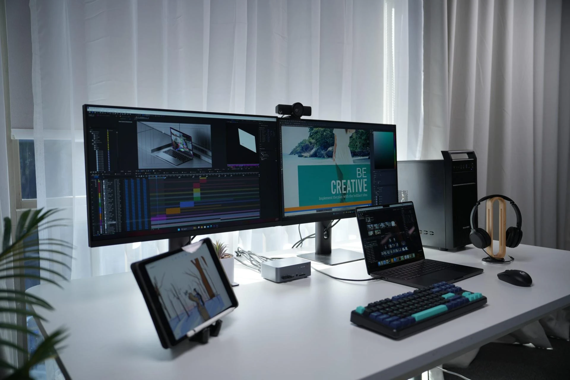 dual monitor kvm switch for a laptop and a desktop computer
