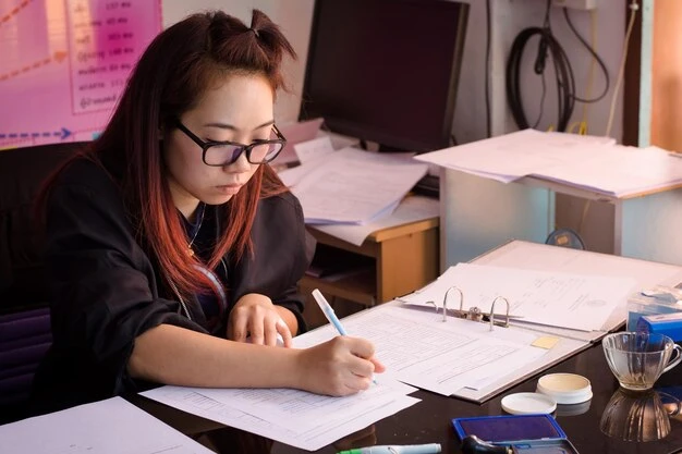 Young woman sitting on table