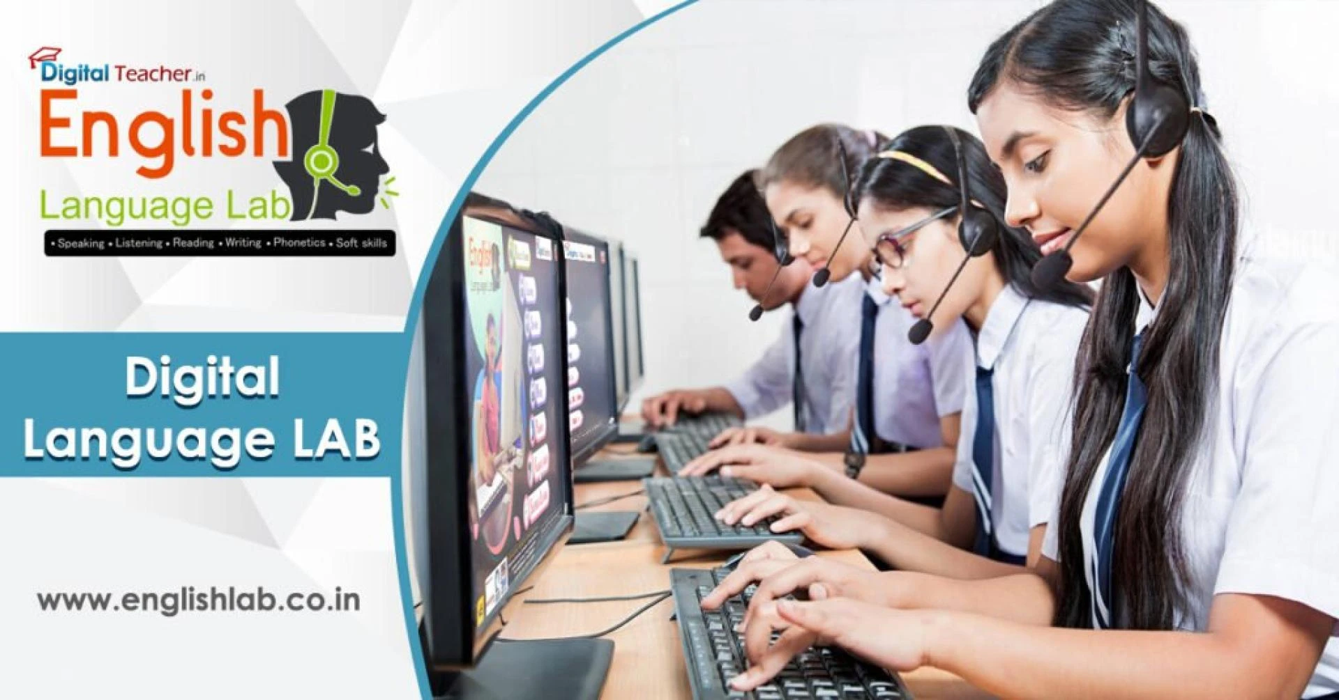 Four schools students are using computers in a English lab classroom. They are wearing uniforms and headphones while typing on the keyboards.