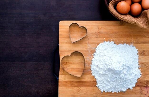 Preparing an ingredient with eggs and flour for cooking homemade sweet cake for Valentine.