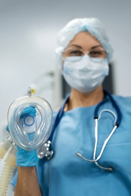 Doctor holding respirator