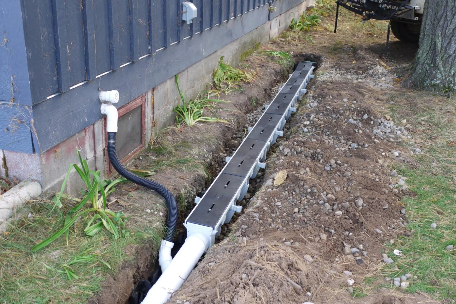 Expert French Drain Installation for Superior Moisture Control By Hawk
