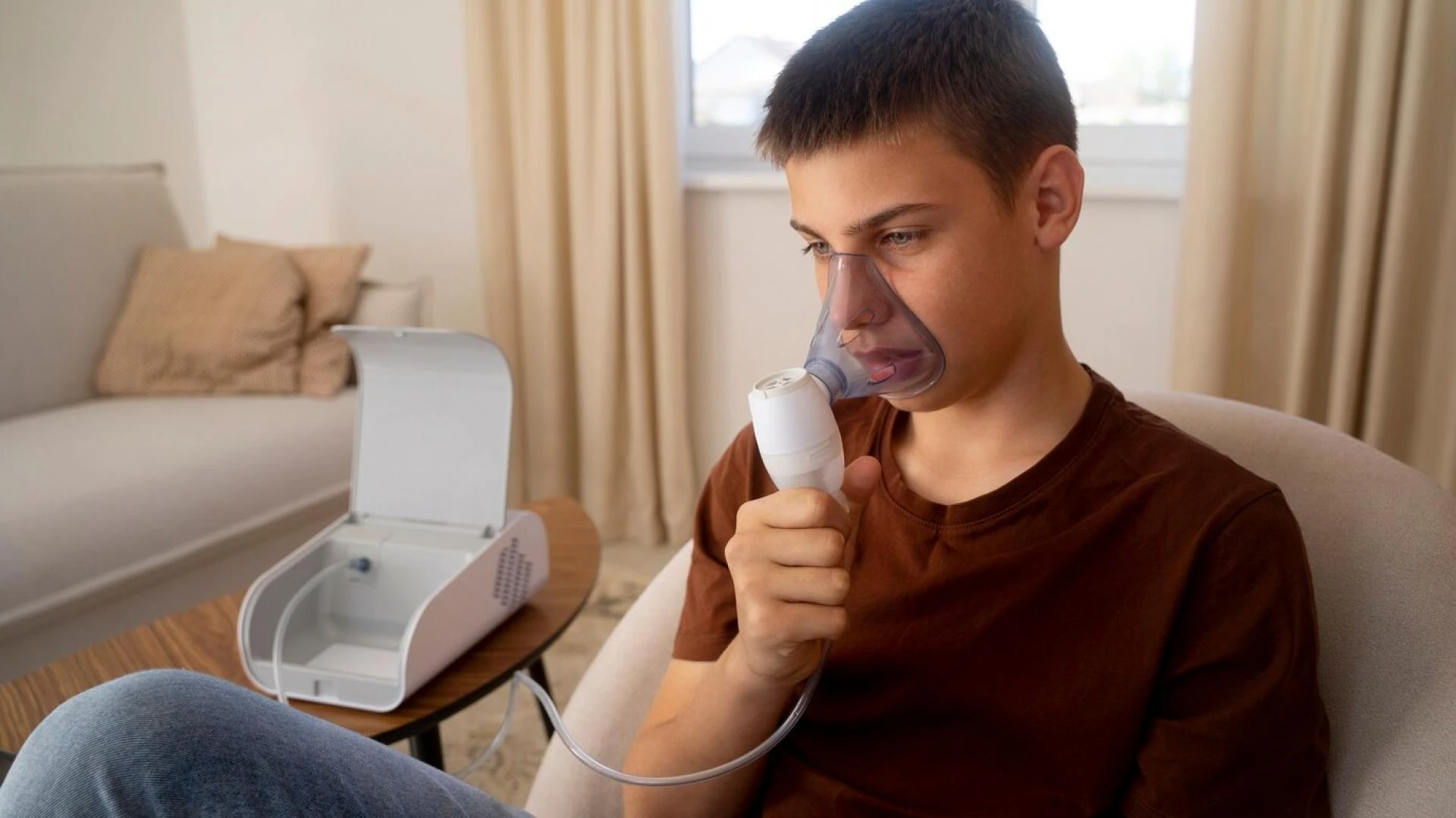 What are the different types of breathing treatments available for asthma?