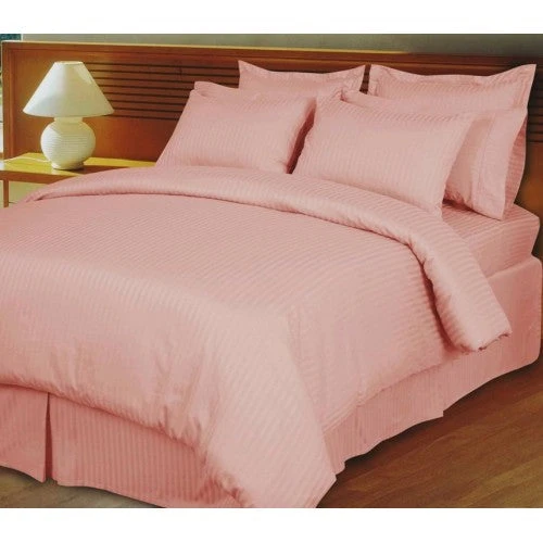 Elegance Starts with Comfort: Styling Your Bedroom with Blush Colored Sheets and a Beige Bed Skirt