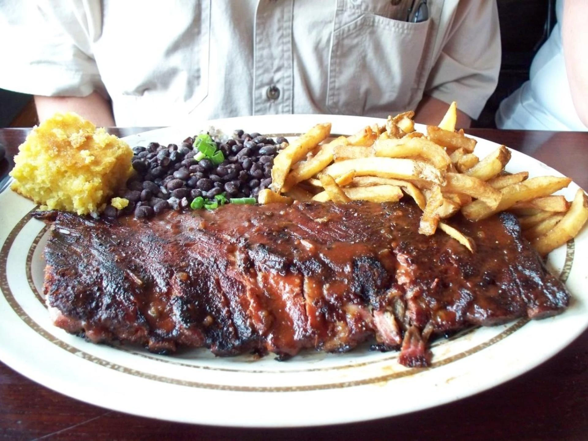 Behind the Smoke: Exploring Dinosaur Bar-B-Que’s Flavorful Legacy