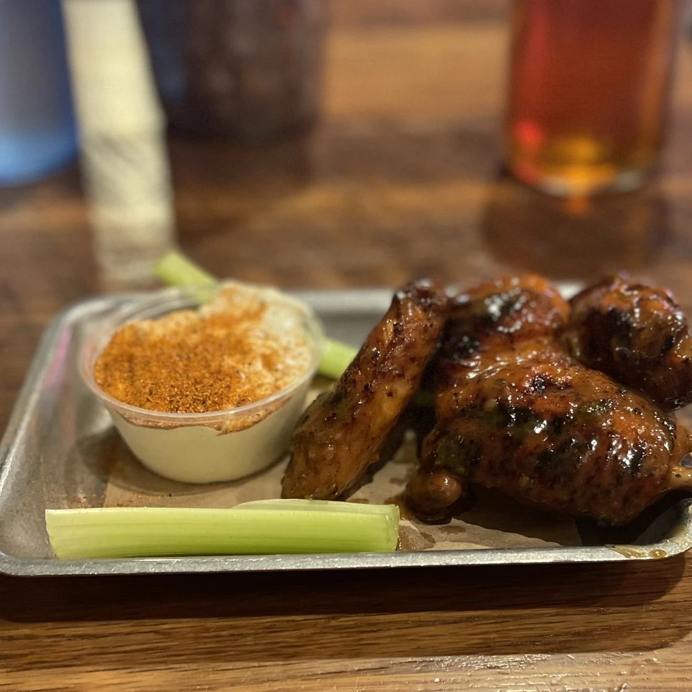 Behind the Smoke: Exploring Dinosaur Bar-B-Que’s Flavorful Legacy