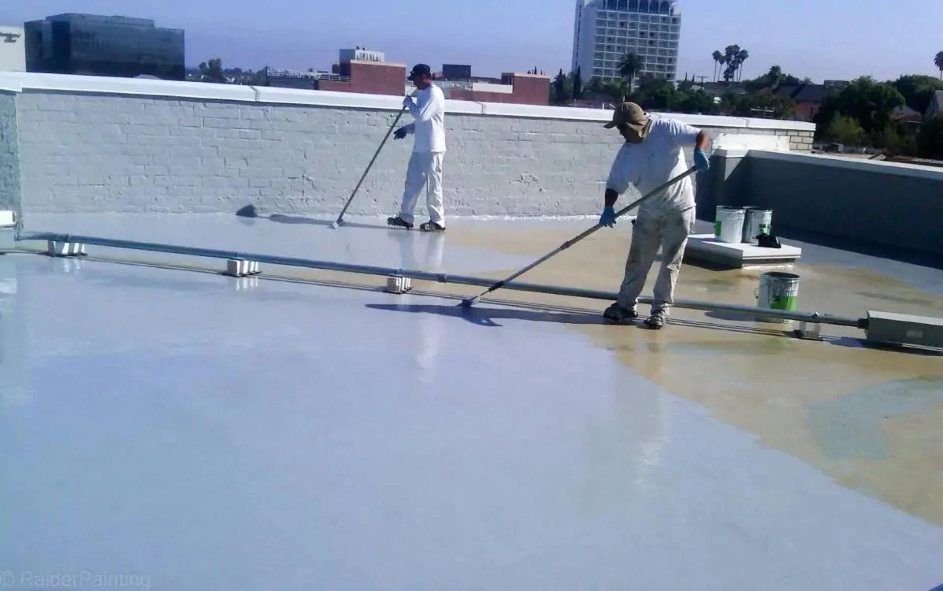How Roof Coatings Protect Your Building from Weather Damage