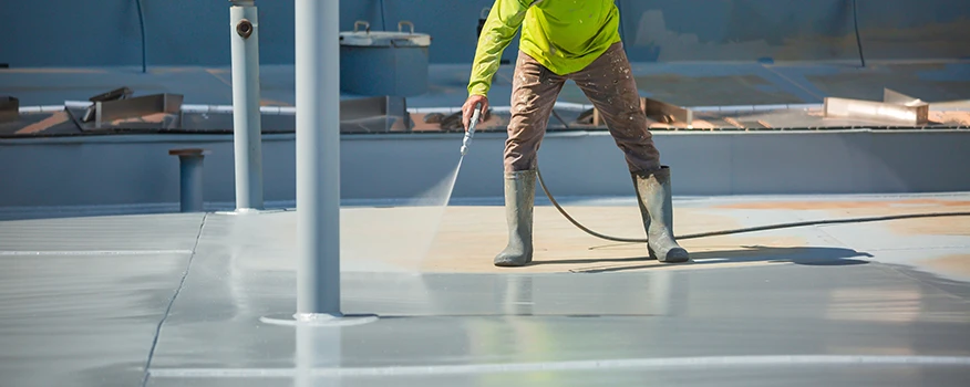 How Roof Coatings Protect Your Building from Weather Damage