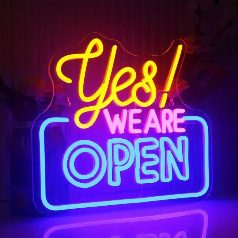 Light Up, Gear Up, and Stick Out: Creative Branding with Custom Neon Signs, Workwear & Car Stickers