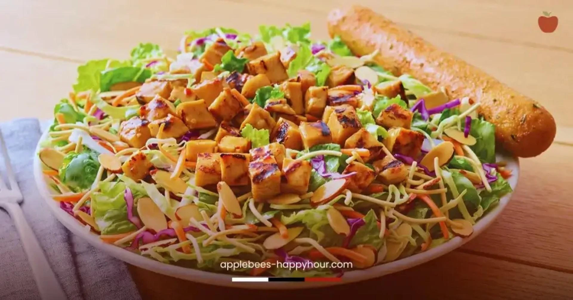What gives Oriental Chicken Salad its signature flavor?
