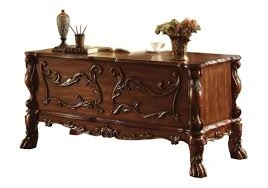 A Timeless Workspace: The Enduring Appeal of a Carved Wood Desk