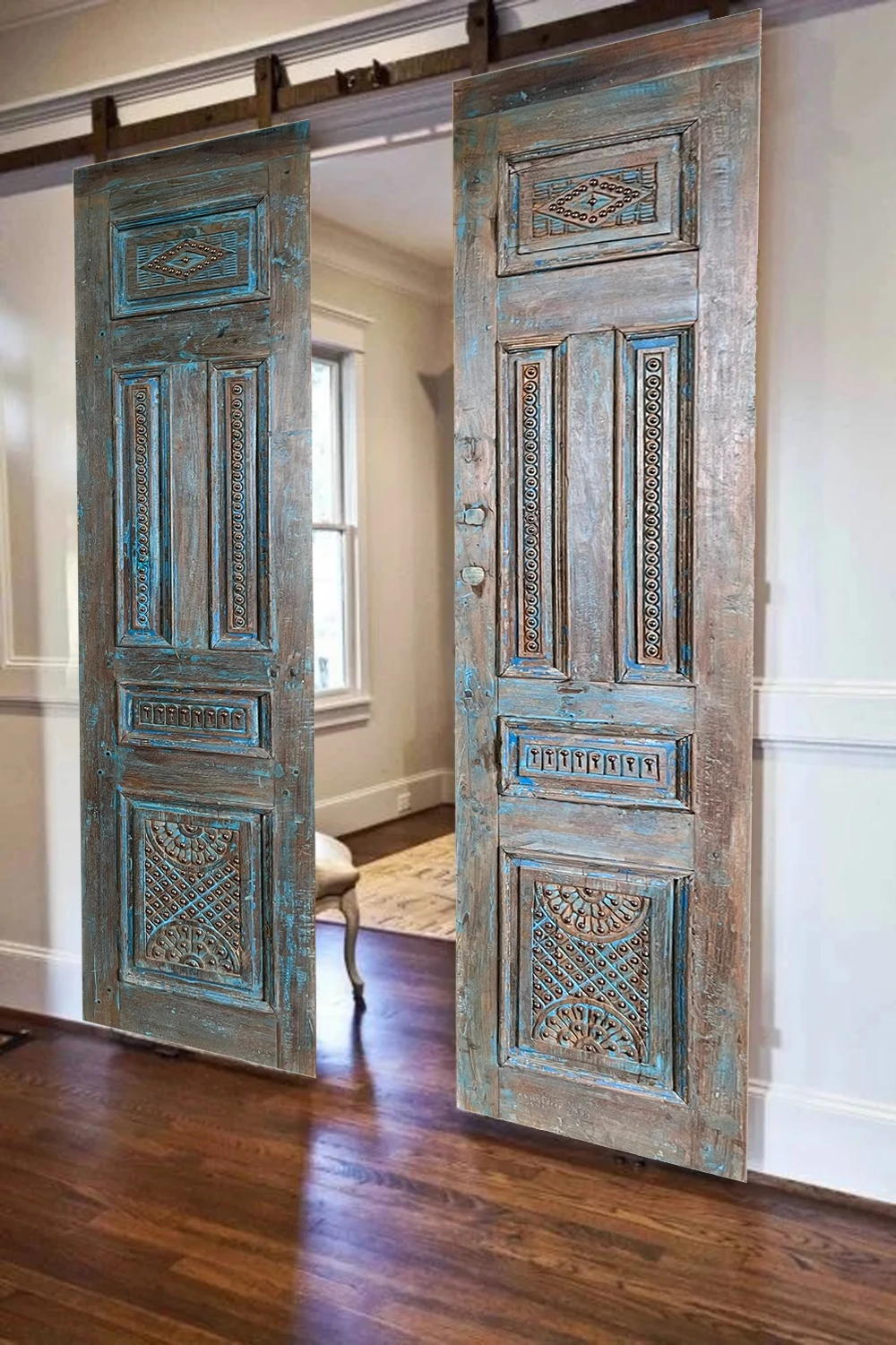Resort-Style Appeal of Mogul Interior’s Carved Doors