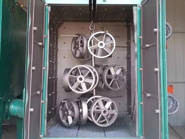 WHEEL SHOT BLASTING MACHINE