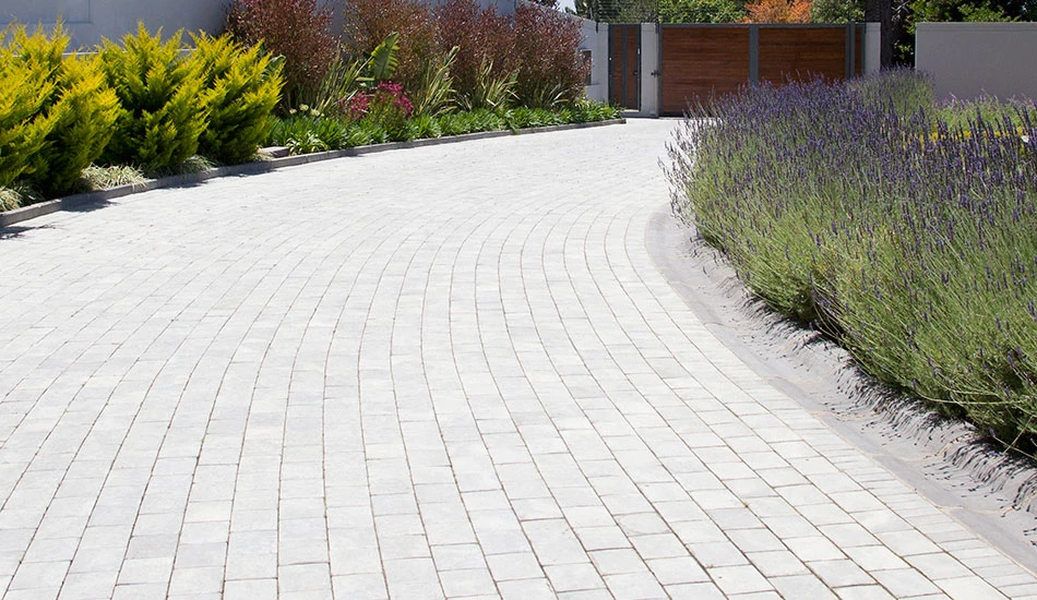 Gravel vs. Pavers for Driveway Edges: Pros, Cons, and Cost Breakdown
