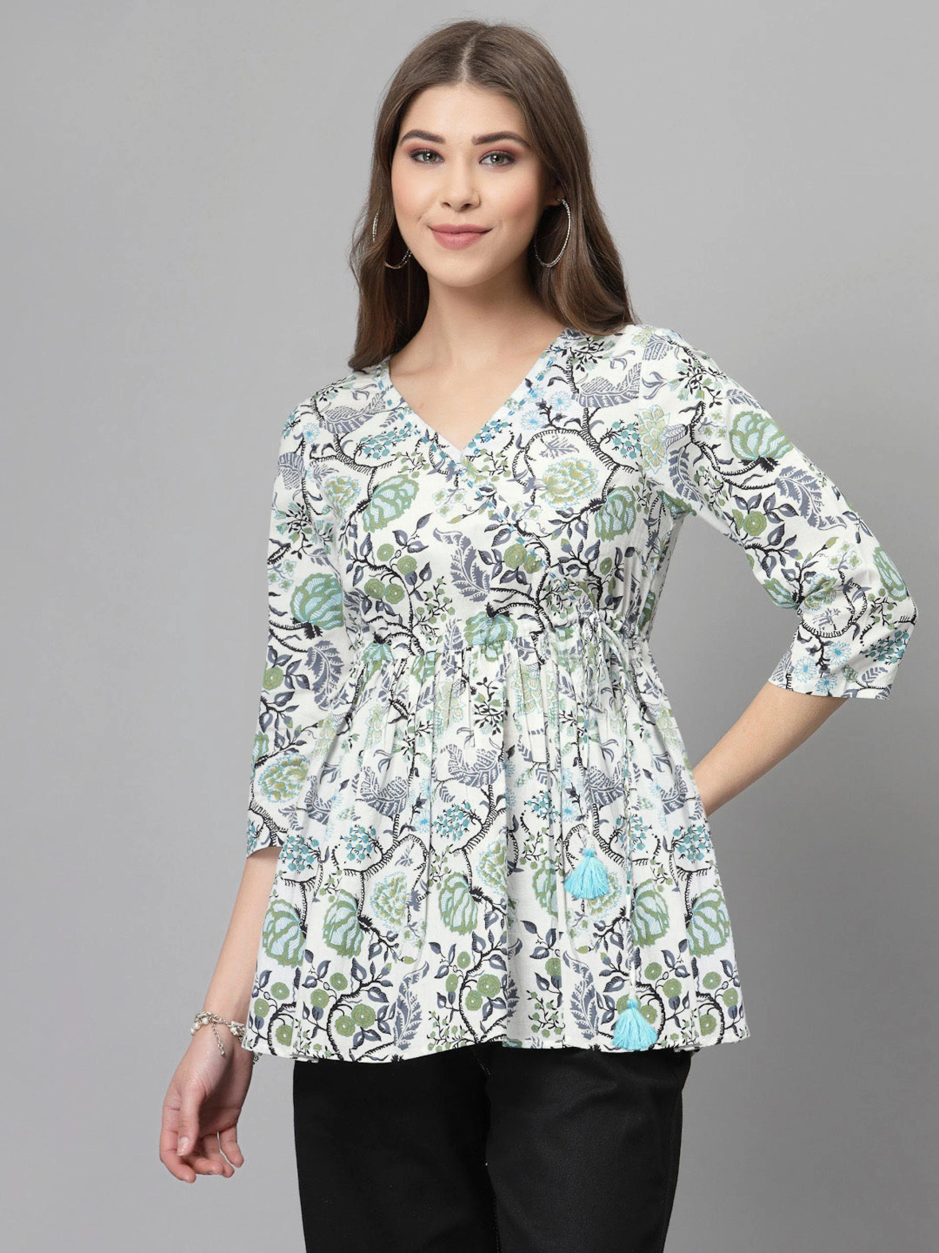 How to achieve elegance with a simple white and black printed top