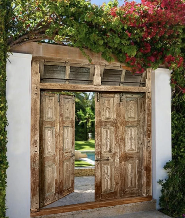 Grand Entrance with Custom Double Carved Doors by Mogul Interior