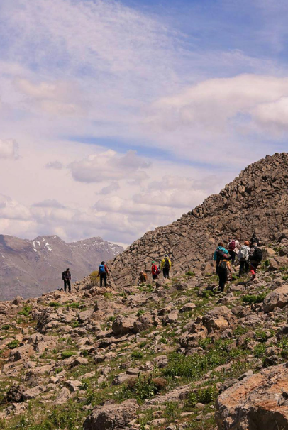 A group on a rocky trail. 