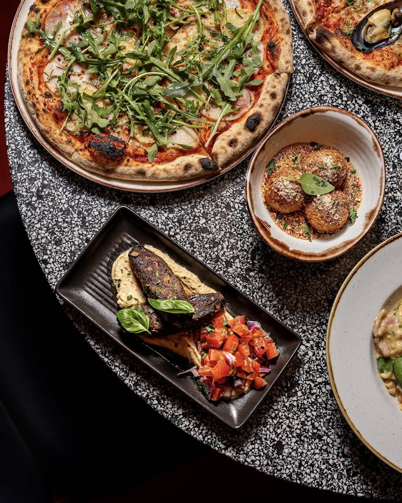 The Science of the Smoke: Why Traditional Woodfired Pizza is a Cut Above