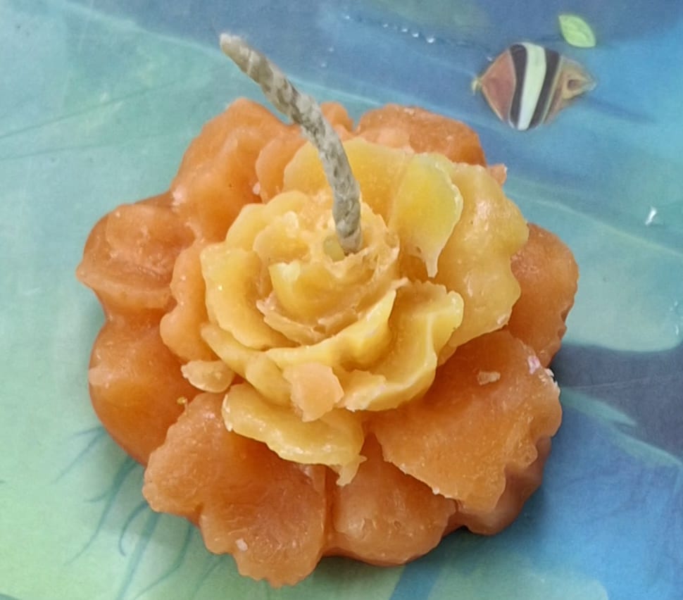 Orange flower candle