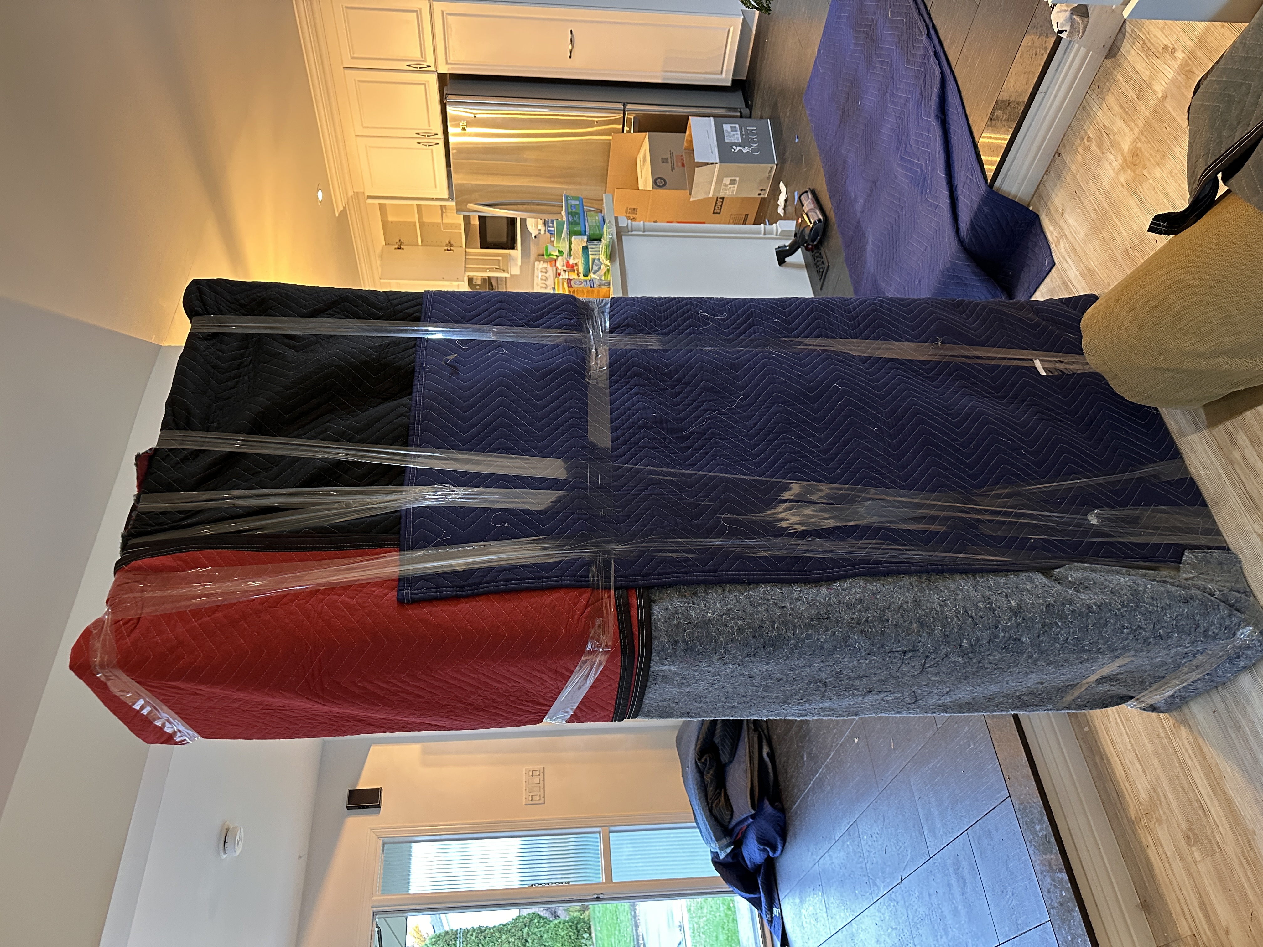 Furniture carefully wrapped before transportation.