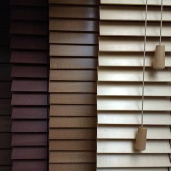 A range of coloured wooden blinds