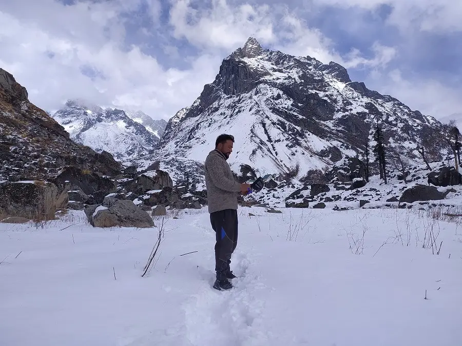 A tourist enjoying snow at Laka Glacier Trek-6f047441