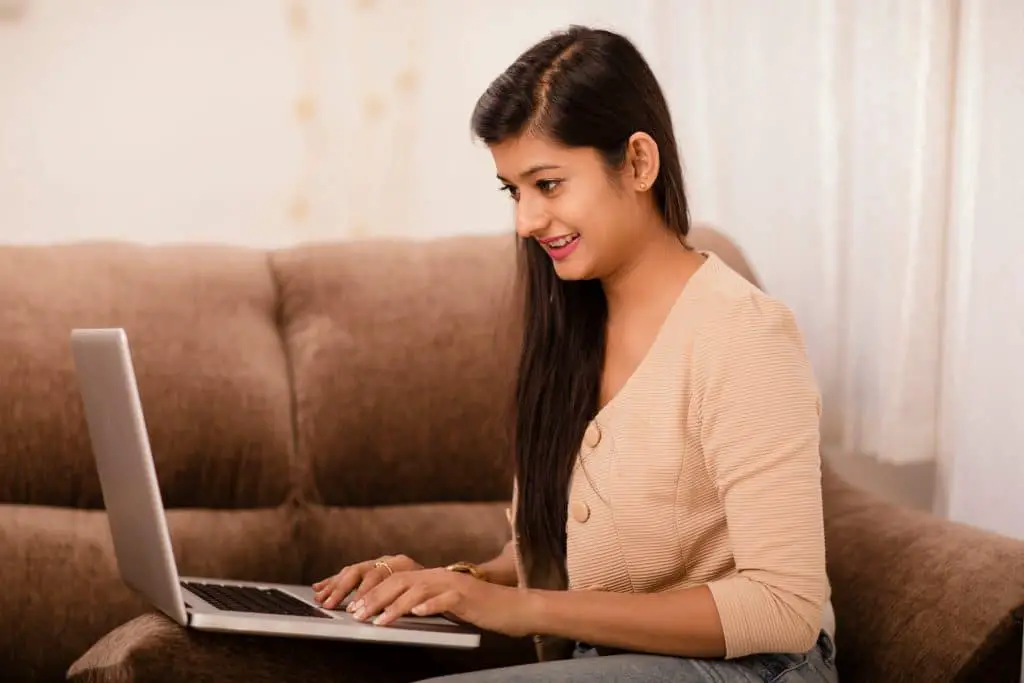 Canva-Young-woman-working-on-laptop-min-1024x683-5b7ab8b1