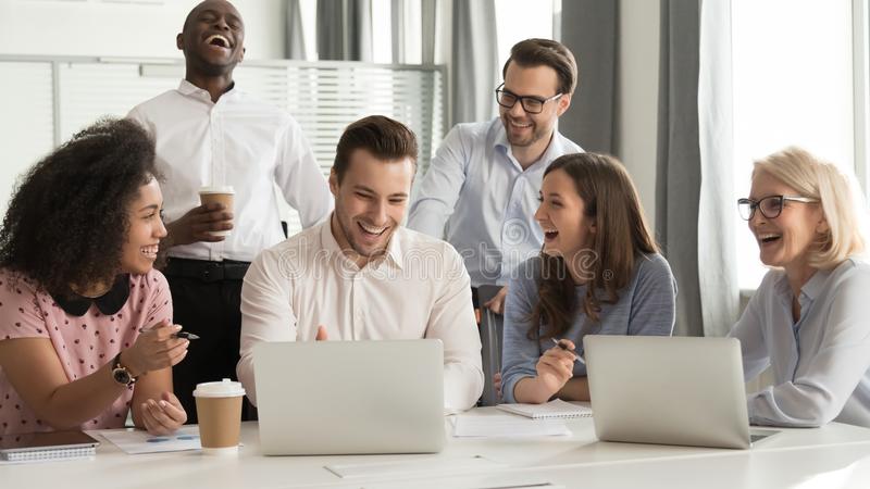 happy-diverse-office-workers-team-laughing-together-group-meeting-cheerful-funny-joke-work-corporate-business-excited-smiling-141680673-4612b695