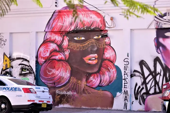 A mural in Wynwood Walls featuring stunning Afro-futuristic artwork.