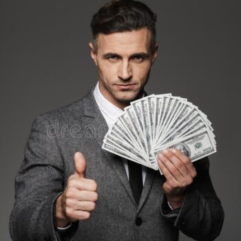 photo-rich-man-s-business-suit-holding-fan-cash-money-photo-rich-man-s-business-suit-holding-fan-cash-money-115311085-2df0e724