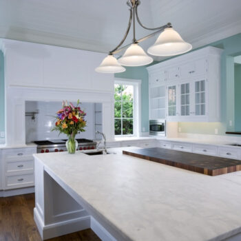Open-space-kitchen-with-White-Quartz-Countertops-4fac4fcc