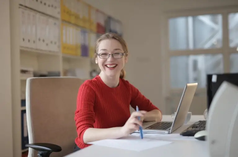 Woman smiling while working     