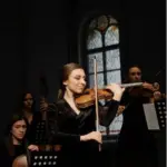 women-playing-musical-instruments-in-an-orchestra-7d9e448f