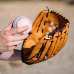 young-woman-with-baseball-glove-8bfef1e0