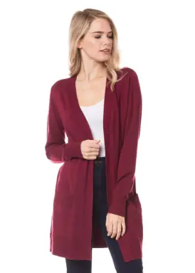 Woman wearing burgundy Jenny cardigan with dark jeans and white top
