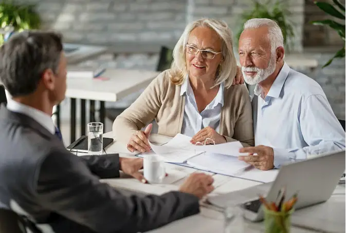 Screenshot 2023-01-04 at 11-56-17 Free Photo Happy mature couple talking with real estate agent while analzying housing plans on a meeting in the office-dc23da22