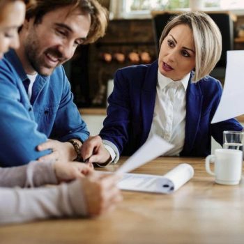 Screenshot 2023-01-24 at 12-27-17 Free Photo Insurance agent talking to young couple while analyzing document during a meeting at their home-0f8298e4