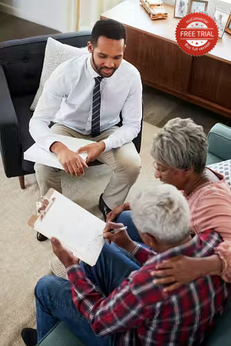 senior-couple-meeting-with-male-financial-advisor-at-home-and-signing-document-1-23e3ed6f