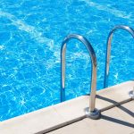 close-up-of-a-ladder-in-a-pool-cincinanti-oh-1980x1156