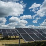 solar-panels-used-renewable-energy-field-sky-full-clouds (1)-d3032545