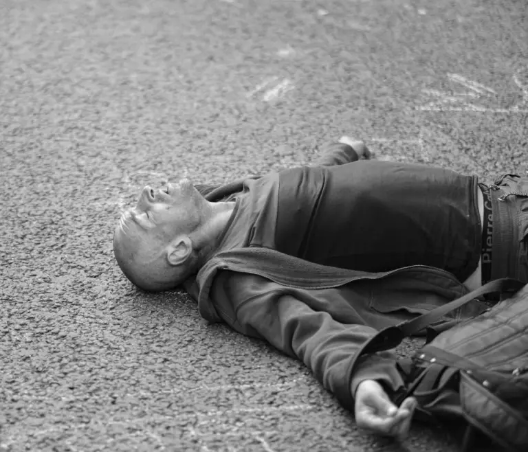 A man lying unconscious