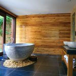 black-tiled-bathroom-with-wooden-acsent