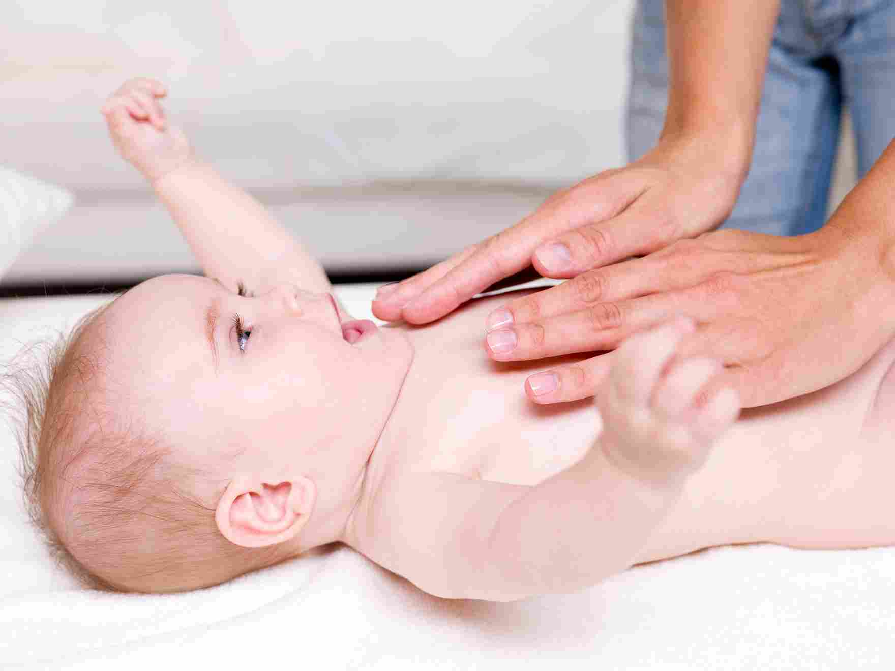 massaging-newborn-baby_11zon