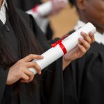 close-up-graduate-students-with-gown (1)